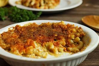 Creamy golden vegan baked mac and cheese with crispy top layer